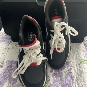 Woman’s black, red, white sneakers. Never worn